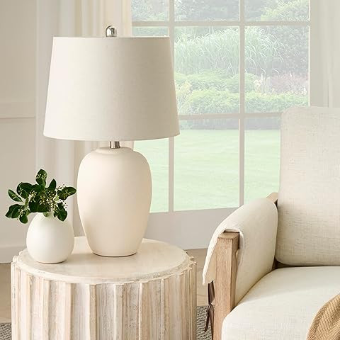Signature Design by Ashley Wardmont Contemporary Modern Table Lamp with Drum Hardback Fabric Shad... | Amazon (US)