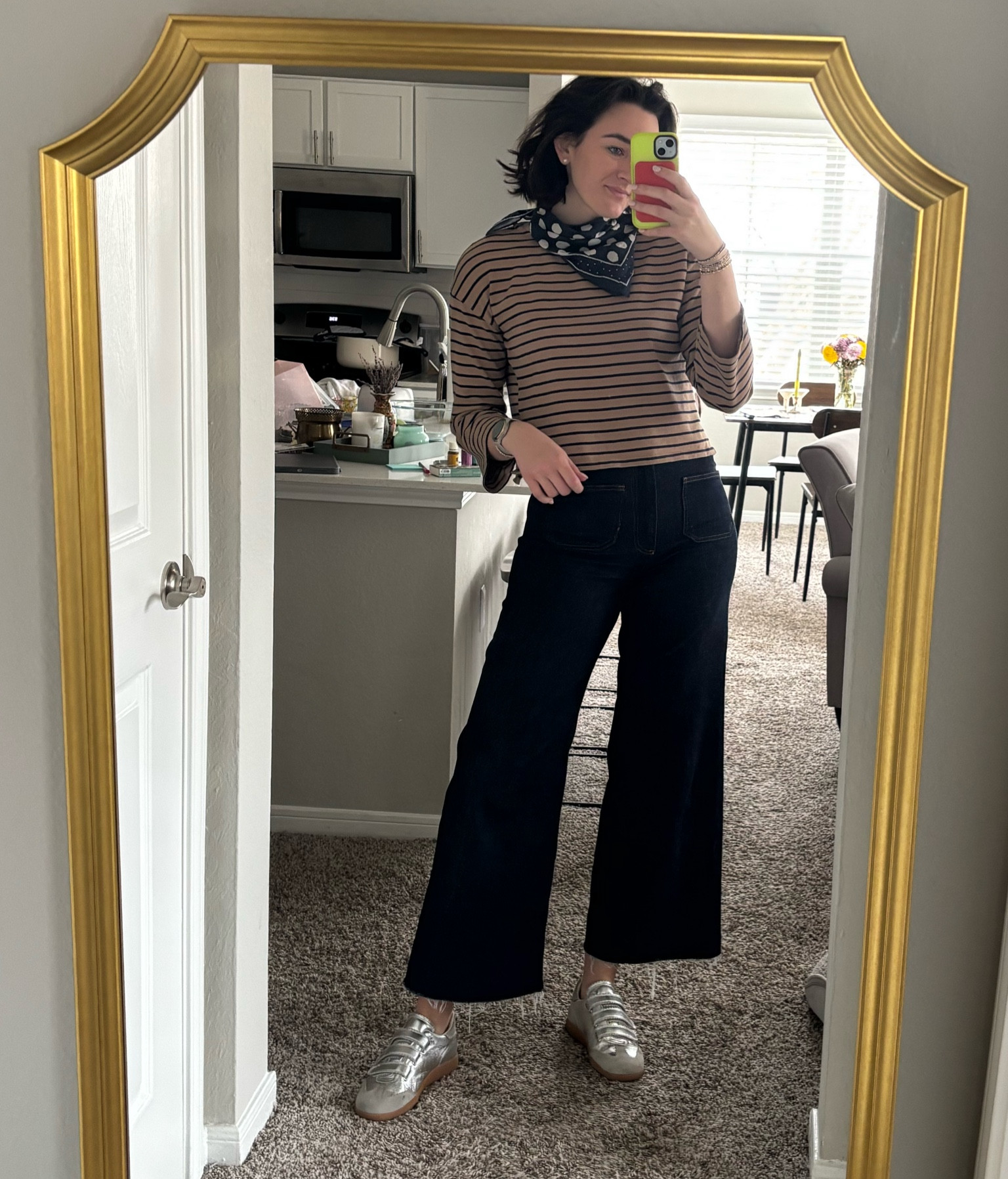 Always in my silver sneakers!! Literally so comfy and a staple for me. My shirt is old from a boutique and these are the Zara Marine jeans with front pockets. I am also wearing an old bandana and earrings from Madewell. I linked some similar shirts and jeans that would work for this look:)

#LTKWorkwear #LTKShoeCrush