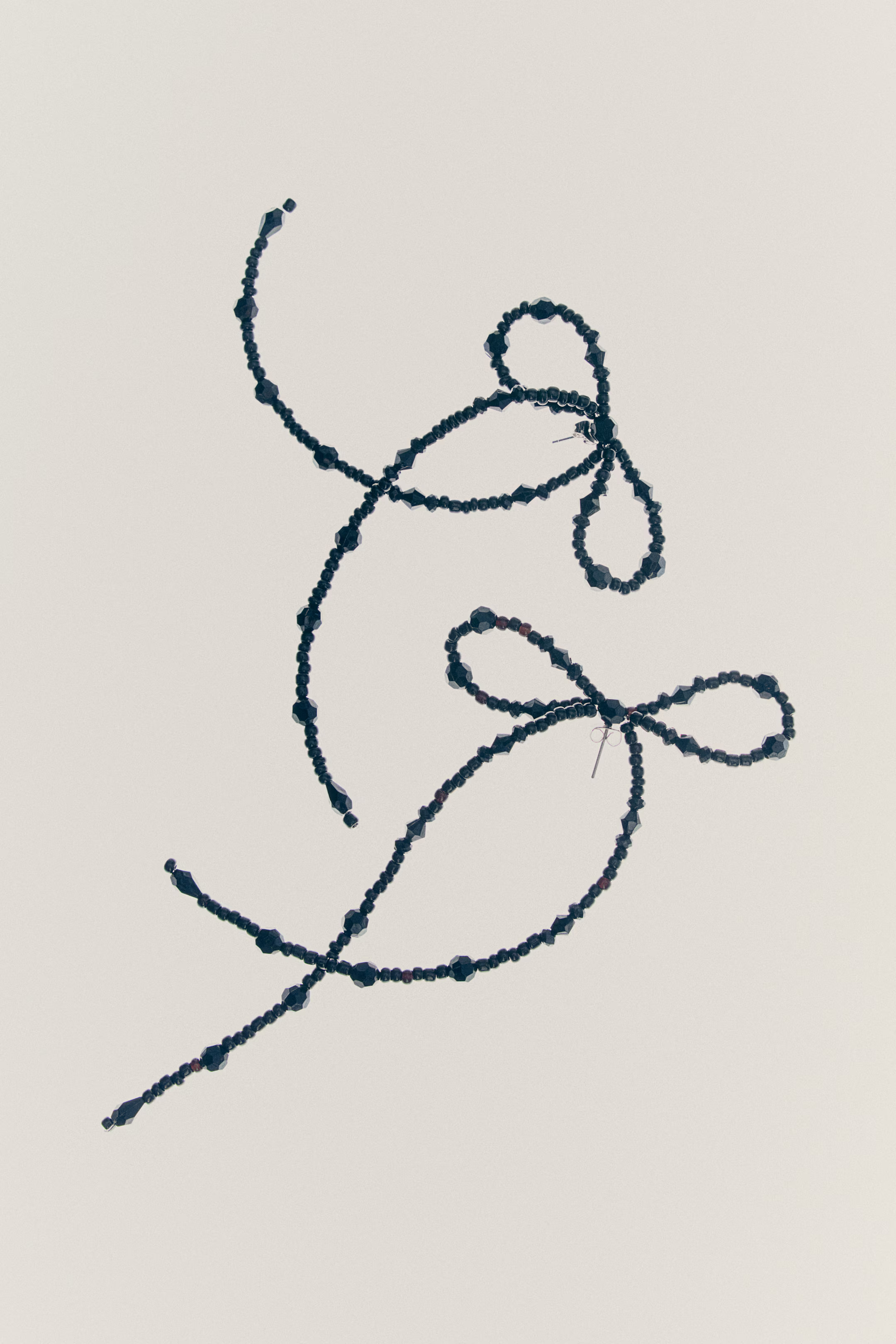 Bow-Shaped Earrings - Black - Ladies | H&M US | H&M (US + CA)