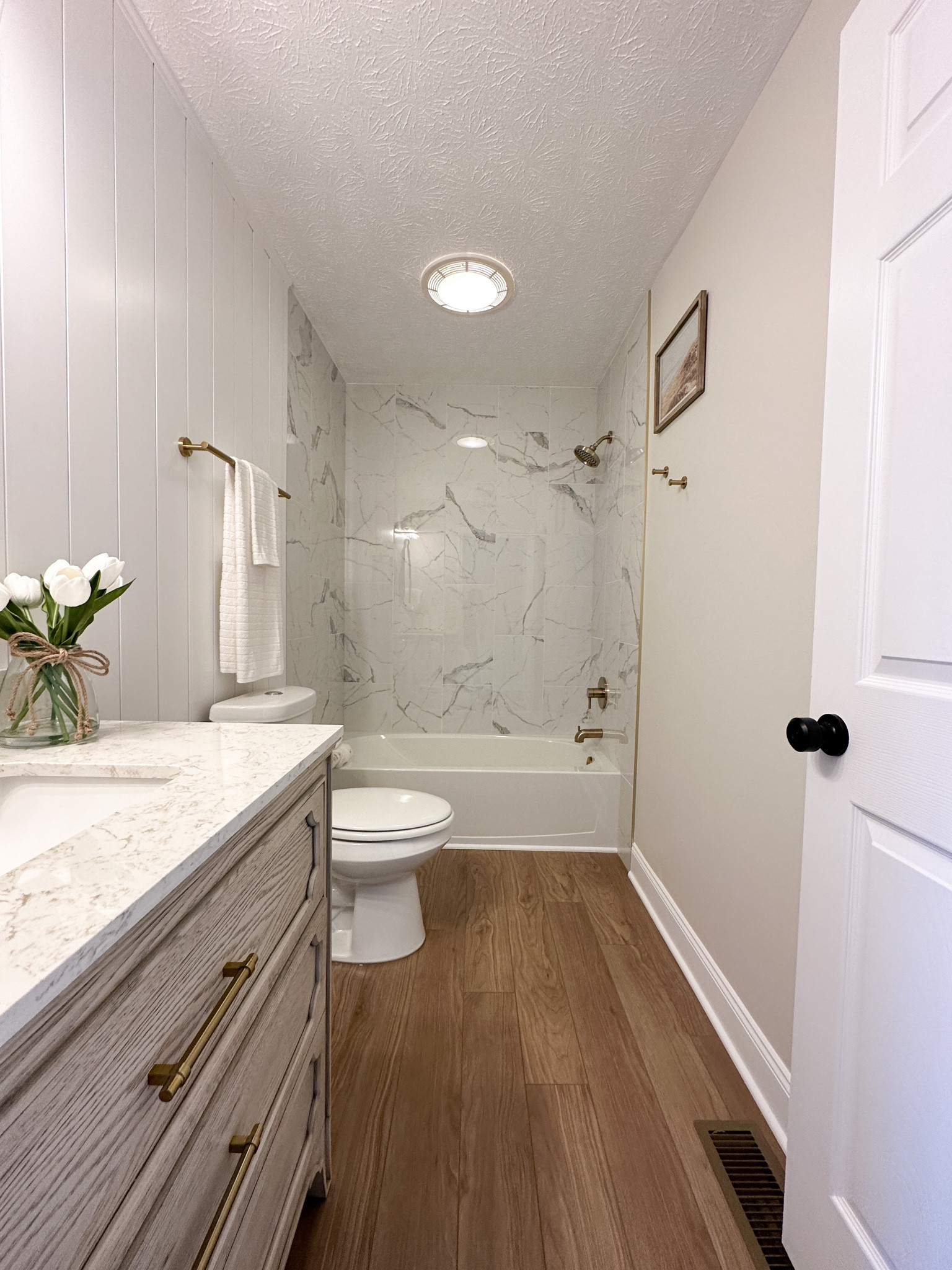 Bathroom remodel // full bath // tile shower // wood vanity // shiplap

#LTKunder100 #LTKFind #LTKhome