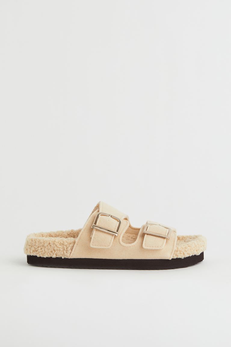 Slippers in soft faux shearling with adjustable straps in fleece. Patterned soles.CompositionLini... | H&M (US + CA)
