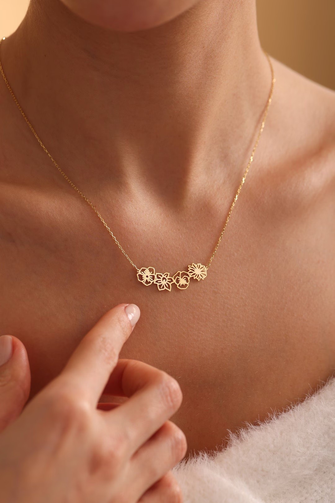 This delicate birth flower necklace brings a personal touch to everyday style with its minimalist charm and meaningful design. Crafted to order in your choice of rose gold, silver, or yellow gold, each piece is hand-made with care and can be customized to reflect the blooms that represent someone special. It’s a lovely way to celebrate moms, daughters, partners, or friends—perfect for birthdays, Mother’s Day, or heartfelt gifting any time of year. #LTKGiftGuide #EtsyFinds #BirthFlowerNecklace #PersonalizedJewelry #GiftForHer #MinimalistStyle #HandmadeJewelry

#LTKGiftGuide #LTKFindsUnder50 #LTKHoliday