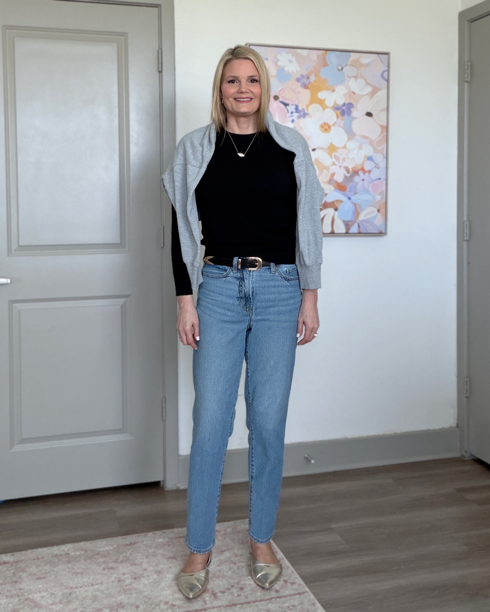 My Super Bowl party OOTD. Casual black crewneck sweater, straight leg high-waist jeans. Evil eye necklace and gold hoops. Football  

#LTKTall #LTKootd #LTKOver40