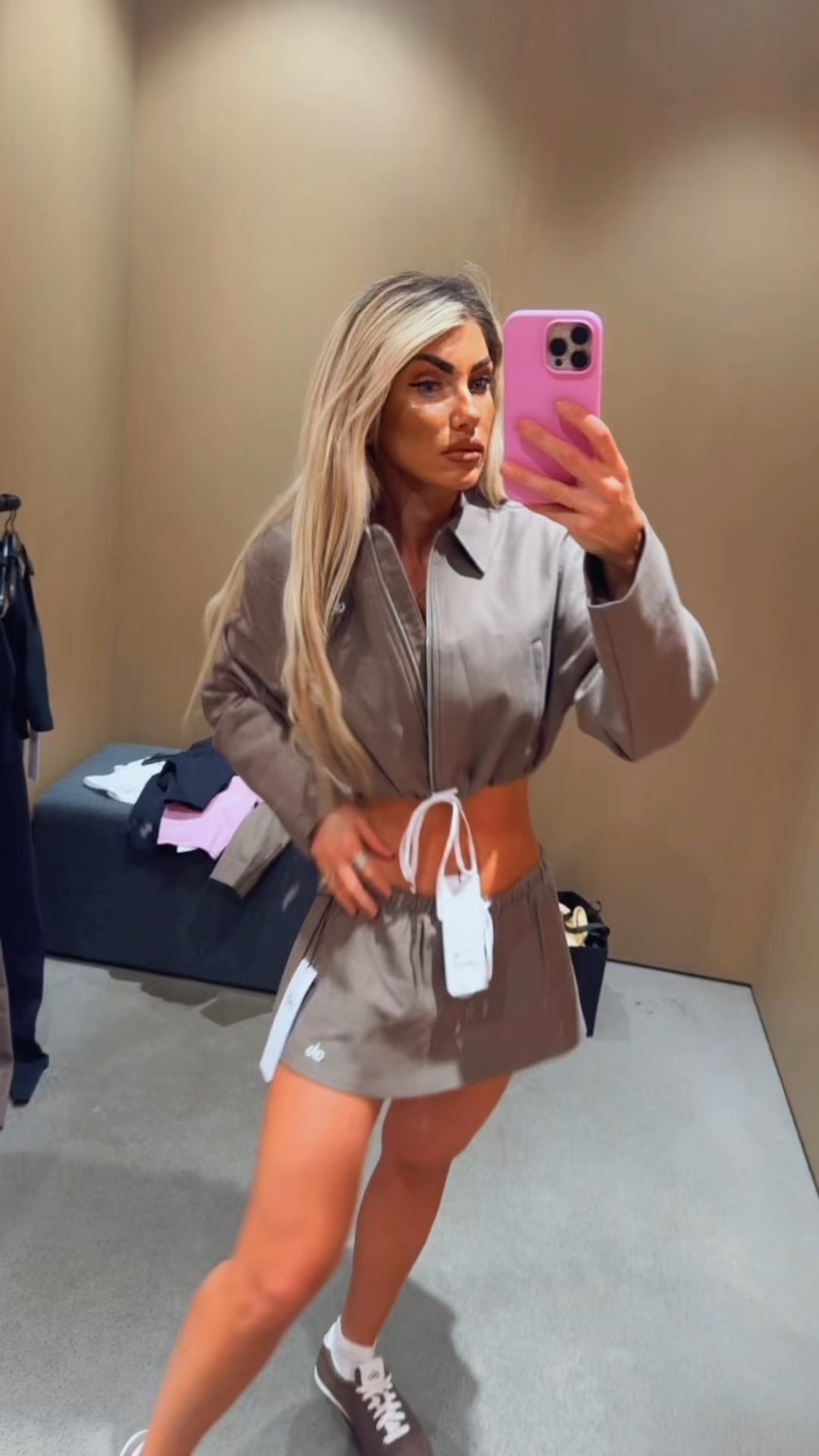 I am wearing XXS jacket and S skirt 