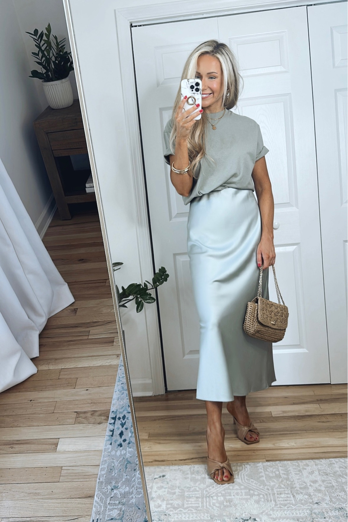 Styling this light green slip skirt casually!