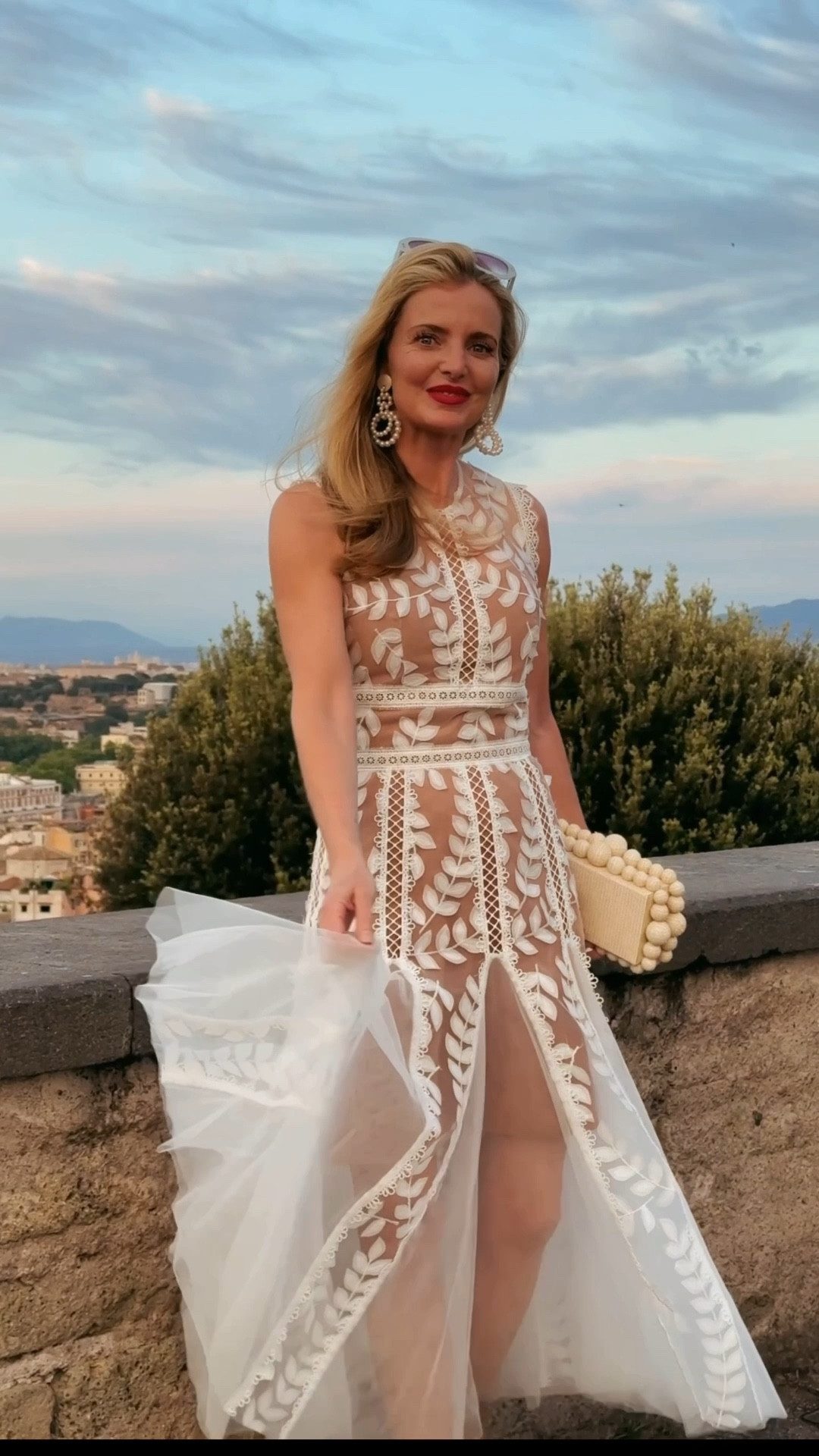 This stunning white dress is one of my all-time favorites. I’ve worn it many times, but my most memorable experience was wearing it to the Vatican City on a family trip to celebrate my 50th birthday. When we were sightseeing I dressed it down with some chic white sneakers and a white jacket, then switched to heels for dinner. It’s soooo special! It would also be a beautiful dress for Easter if you plan to dress up. 

~Erin xo

#LTKSeasonal #LTKWedding #LTKSaleAlert