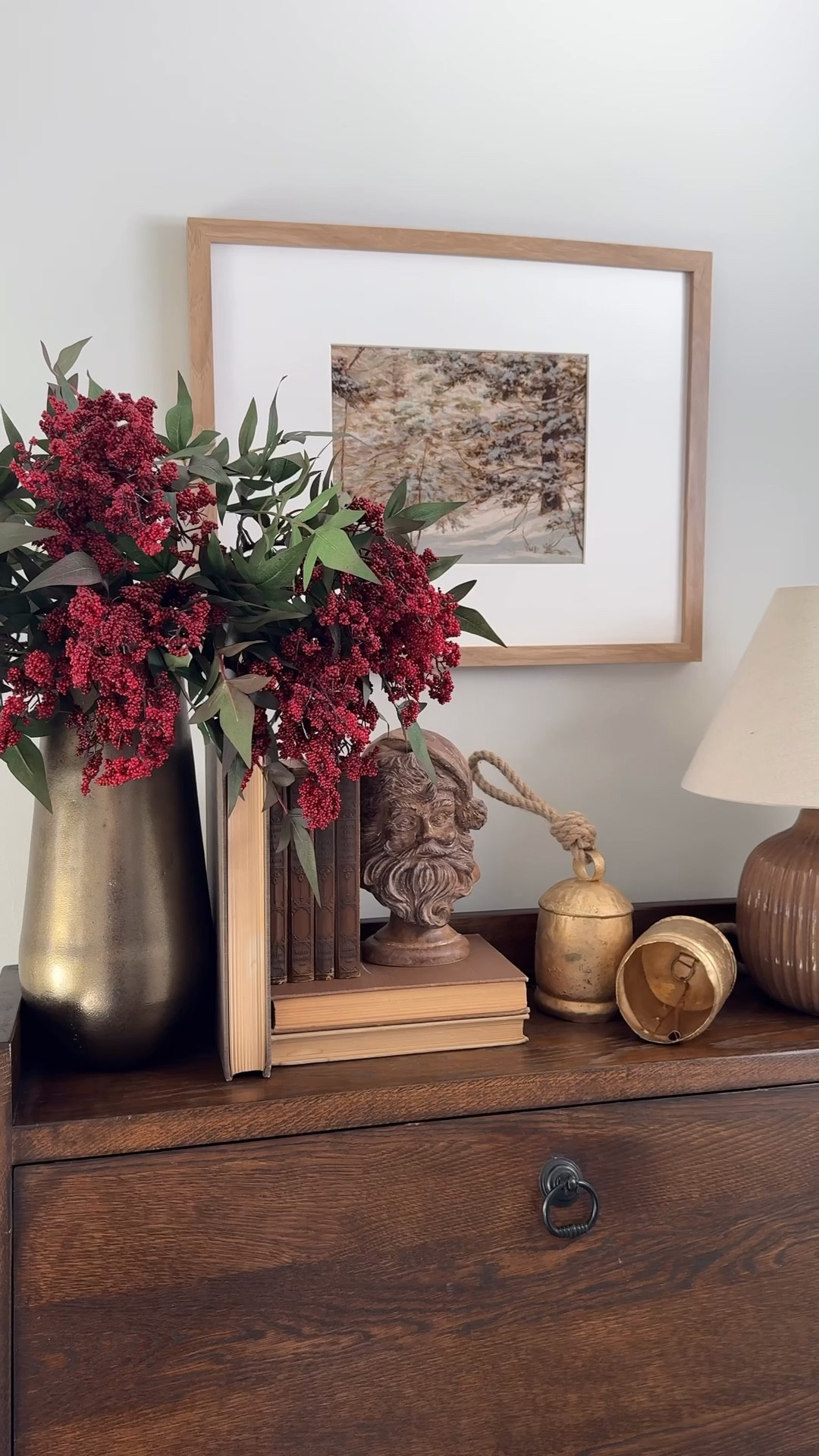 A merry vintage Christmas vignette. Styling holiday decor. Christmas decor. Antique Christmas vintage Christmas. Berry stems. Want decor. Vintage books  

#LTKSeasonal #LTKHoliday #LTKHome