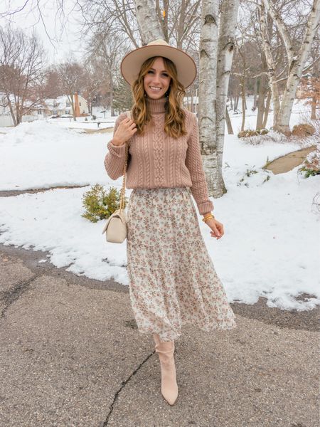 So ready for spring over here, but Mother Nature has different plans. I thought I’d channel spring in my own way with this floral skirt and light neutral colors, even if the ground is still covered in snow!

I’m wearing a size small in the skirt. I sized up to a medium in the cable knit sweater. 





#LTKstyletip #LTKunder50 #LTKSeasonal