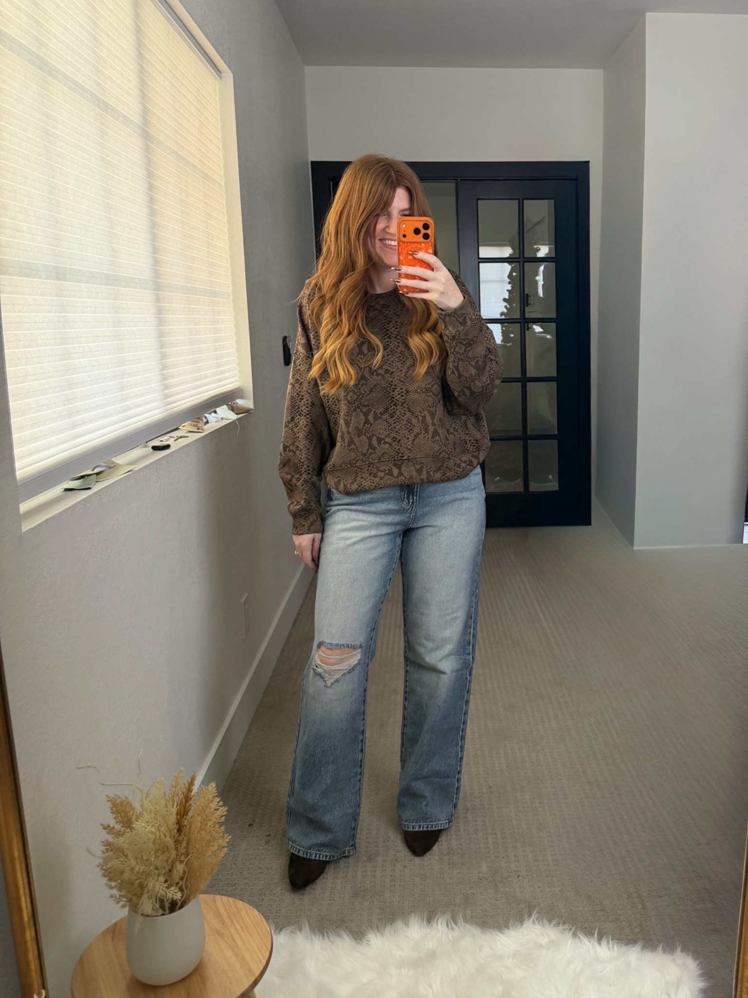The $14 jeans from Walmart are SO good. Wearing size small.