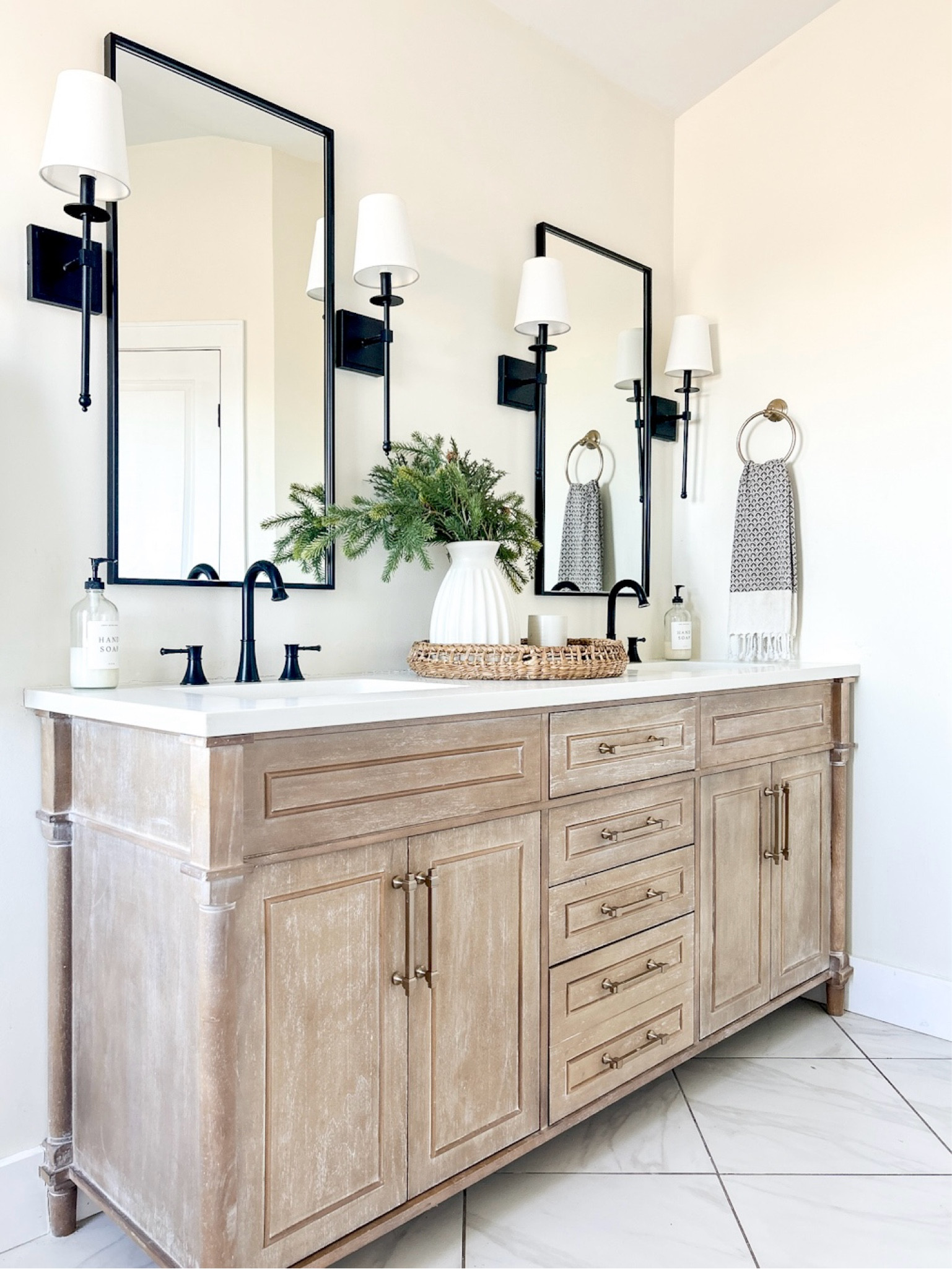 Remodeling a bathroom? This vanity is the best and comes in many sizes. We have had it for years with no issues! We did remove the countertop it comes with and replaced with a custom quartz one.

Bathroom cabinet, bathroom vanity, wall mirror, faucet, vase, hand towel, bathroom decor , wall sconce 

#LTKSaleAlert #LTKHome