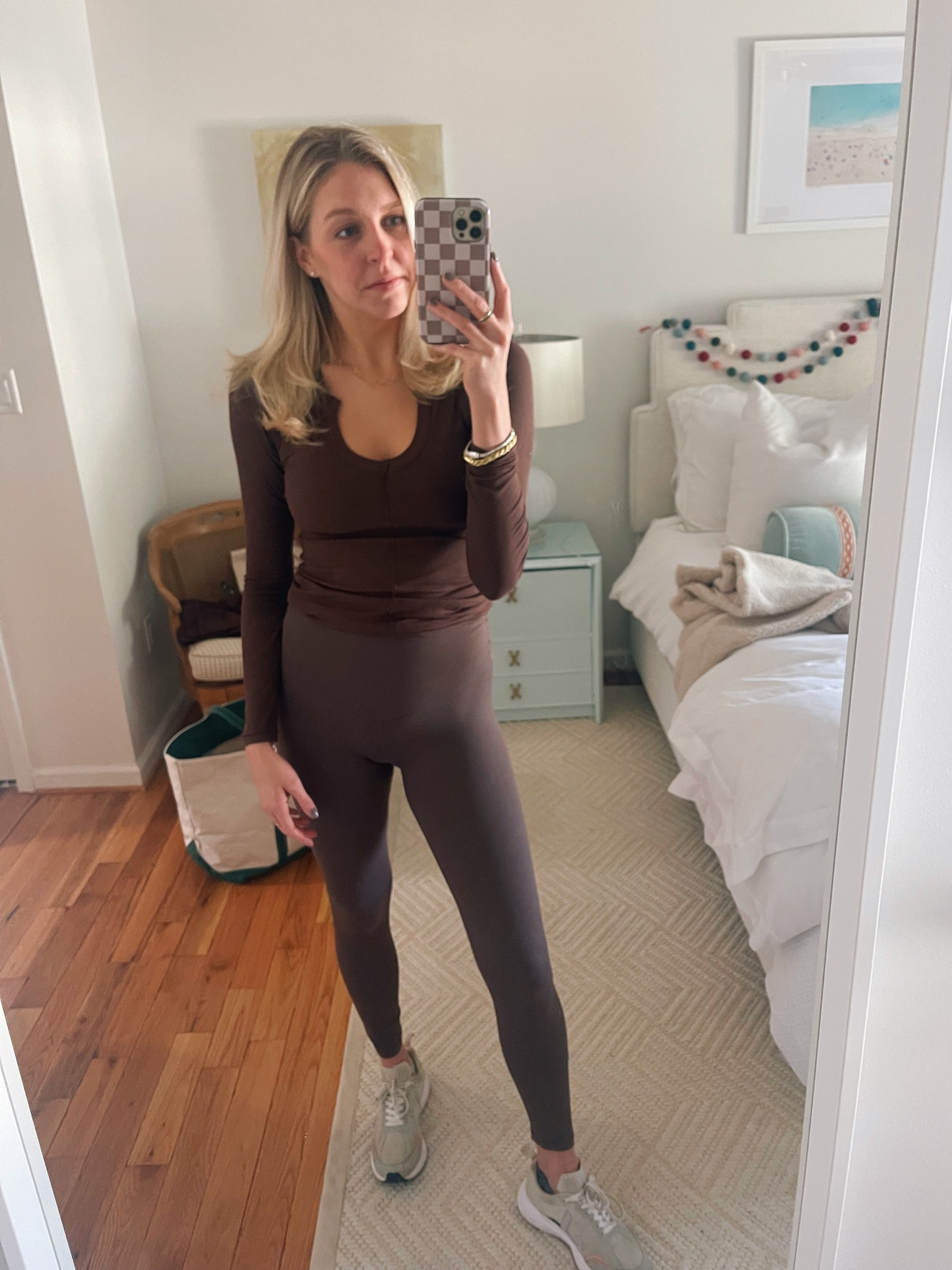Got my skims Black Friday order in 🫶🏼🤎 wearing a medium in the long sleeve tee, crossover bra and got a medium in the PJ pants. Wearing now with my favorite aerie leggings. 