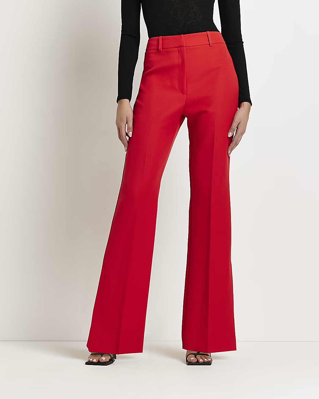 Red split hem flared trousers | River Island (UK & IE)