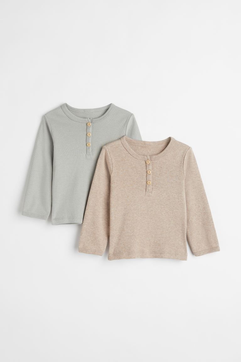 Conscious choice  Baby Exclusive. Long-sleeved henley shirts in soft organic cotton jersey with a... | H&M (US + CA)