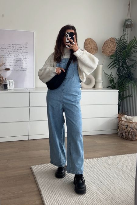 Dungarees are BACK baby!! Styling my classic oversized blue denim dungarees with dr marten Jadon boots, Uniqlo dumpling bag and cable knit jumper for spring outfit inspo 

#LTKstyletip #LTKfindsunder50