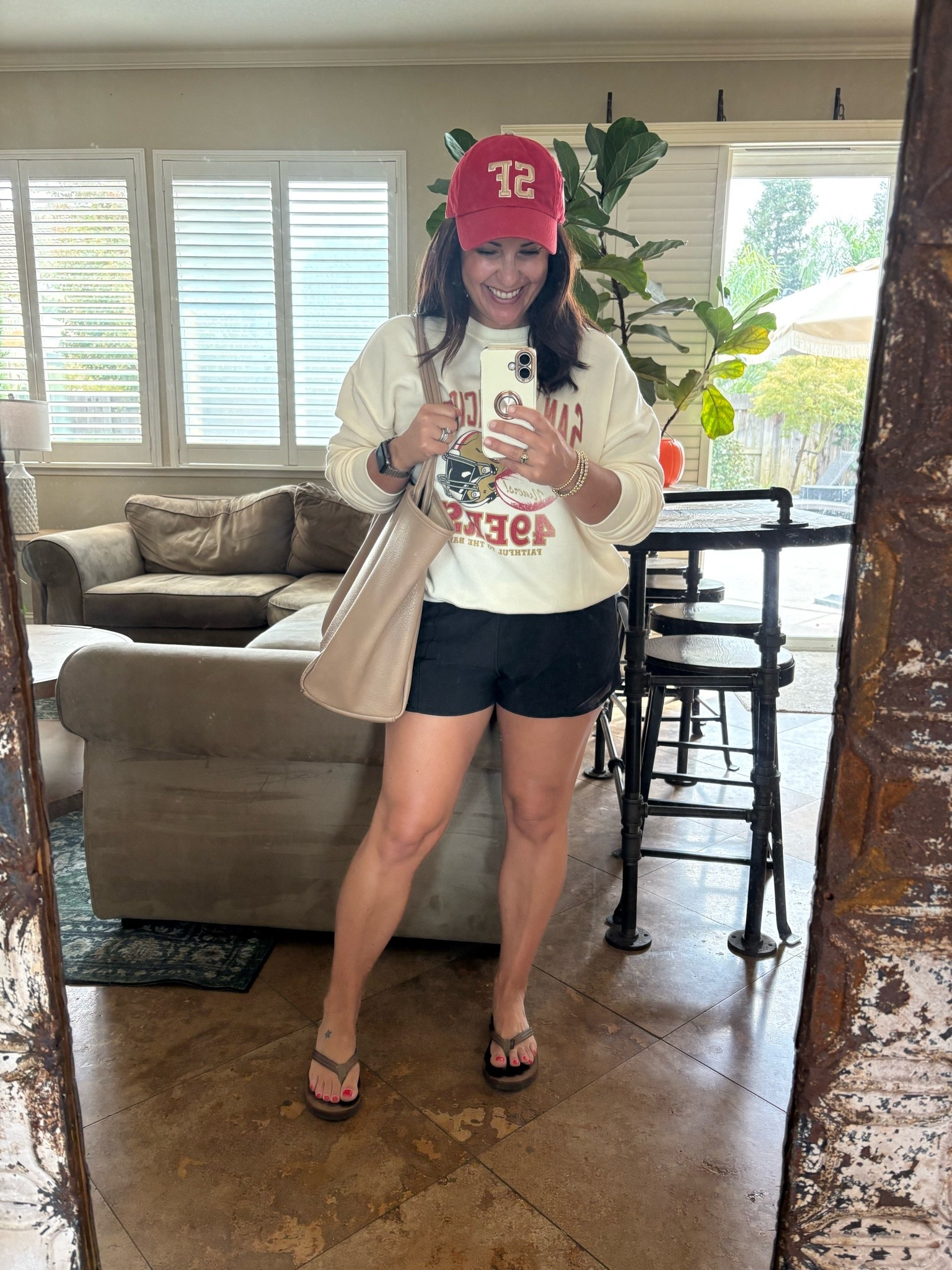 🏀 Off to my daughter’s basketball tournament, but you know I had to rep the 49ers! ❤️💛

Keeping it casual and comfy in this 49ers sweatshirt, black shorts, my favorite neutral tote, and sandals. Basically my mom-on-the-go meets football fan uniform. 😂

Perfect for casual fall outfits, game day outfits, football outfits, mom style, and weekend casual looks. Everything is linked! ❤️🏈

#LTKFinds #GameDayOutfit #49ers #FallOutfits #CasualStyle

#LTKSeasonal #LTKootd #LTKPetite