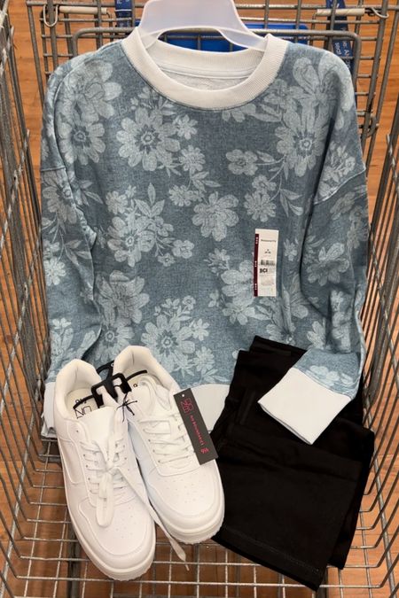 This Walmart crewneck is now just $10! Love this denim blue floral, I got one last year & glad to see it back! Looks cute with white shorts or leggings, too. #walmart #walmartfashion 

#LTKsalealert #LTKunder50