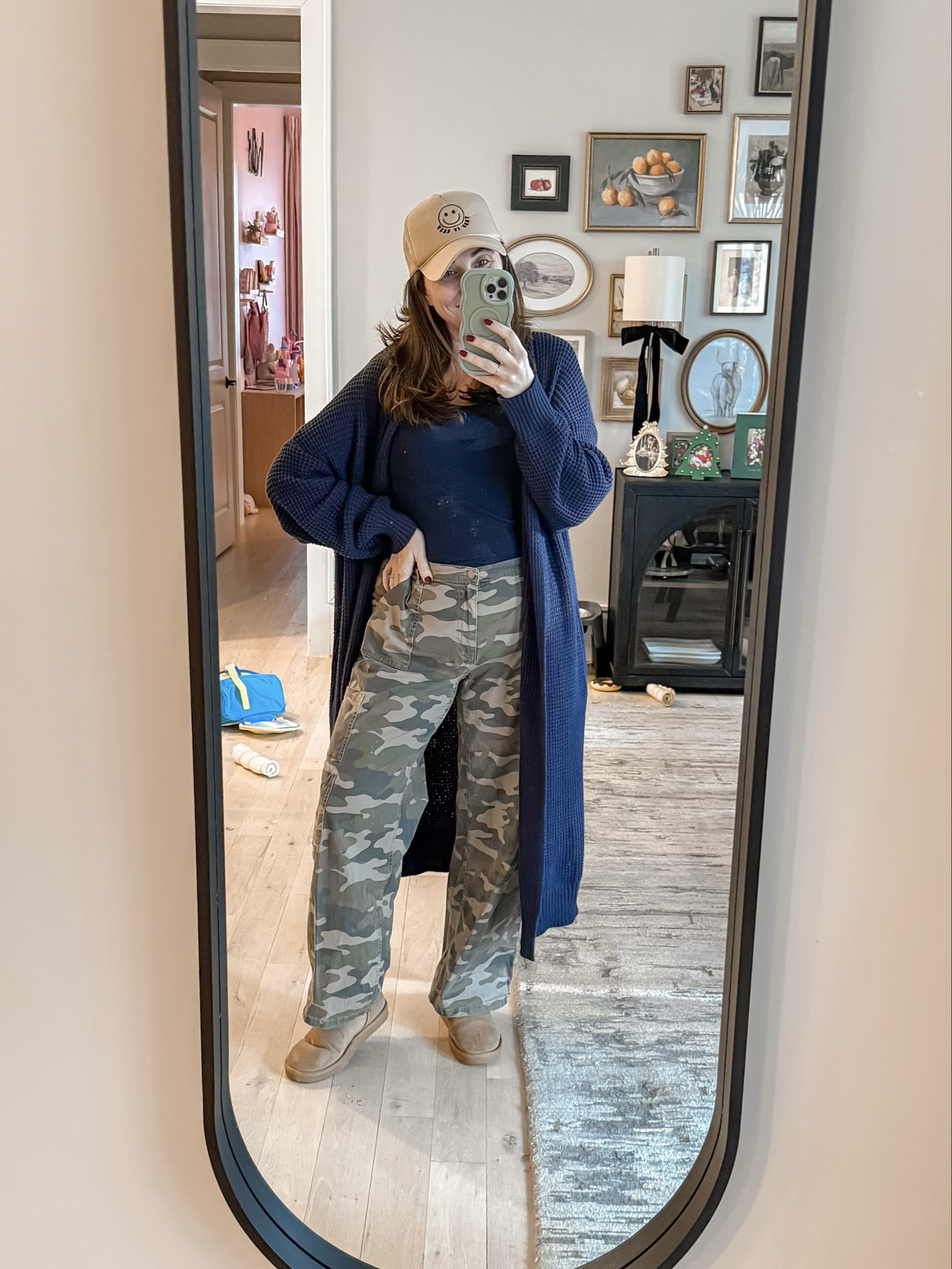 Felt cute in this look! I don’t know why I don’t reach for this extra long Amazon cardigan more. It’s like wearing a blanket! Also, these viral camo pants from Walmart live up to the hype. Elastic waistband in the back makes them extra comfy! Simple tank from Walmart as well
Cardigan L (should of sized down) / Tank L / Camo cargo pants L / Clogs tts 

#LTKOver40 #LTKMidsize #LTKootd