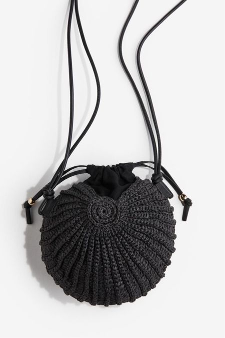 Black seashell raffia crossbody bag 

#LTKfindsunder50 #LTKstyletip #LTKitbag