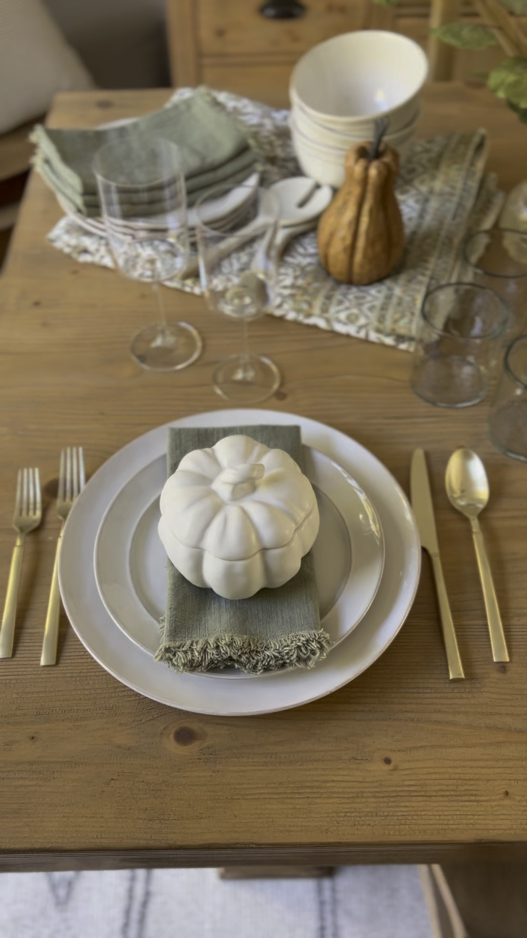 Thanksgiving tablescape.  And easy tablescape idea for hosting Thanksgiving.. this little pumpkin bowl is so cute for you to serve soup or maybe turkey chili. 
Fall tablescape 
Dining table 
Tableware 
Flatware 
Hammered glasses 
Wine glasses 
Linen napkins 
Gold flatware 
Target 
Pottery barn 
McGee and Co 

#LTKhome #LTKHoliday #LTKSeasonal