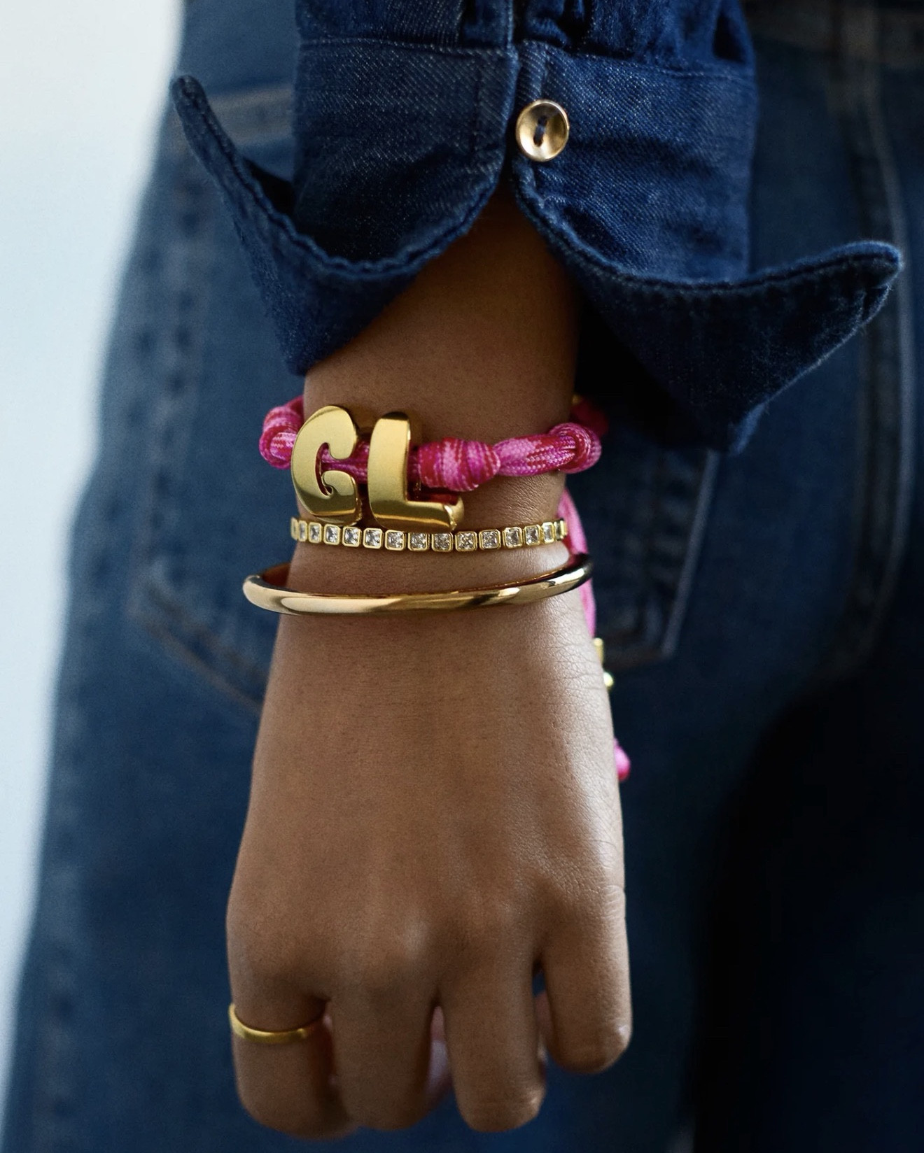 Knotty Initial Custom Bracelet

Personalized with the capital letter of your choice in fun, oversized bubble font
Choose from a glossy gold initial or a sleek silver initial
Adjustable pull-tie so you can get a perfect fit
Waterproof paracord material that's designed for days of wearing (without having to worry about getting it wet)
Initial made from brass and protective PVD vacuum plating to prevent tarnishing

#LTKWorkwear #LTKootd #LTKTravel