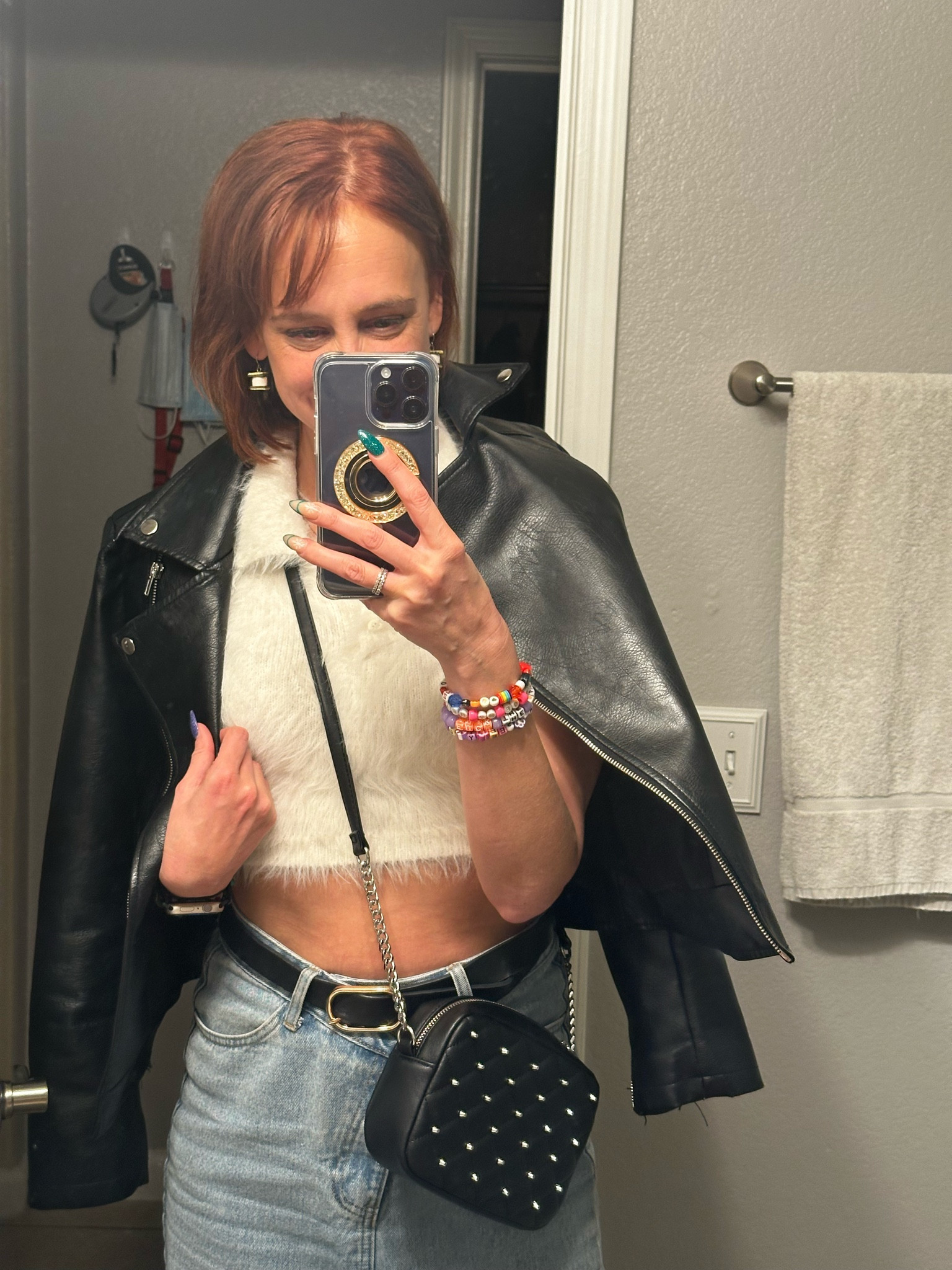 Holiday date night look 
Fuzzy crop polo top 
Denim maxi skirt with slit
Faux leather moto jacket 
Rebecca Minkoff crossbody purse

#LTKSeasonal #LTKHoliday #LTKU