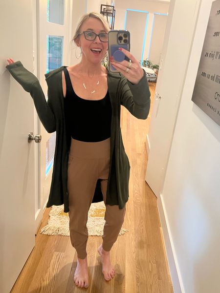 I love these Athleta joggers so much but they are so expensive! 🤑I’m wearing an XS. My bodysuit is from Target, and my green wrap is from Athleta (but no longer available)  

#LTKstyletip #LTKunder100 #LTKfit