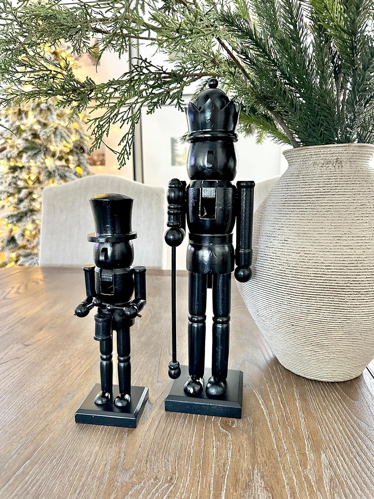 Holiday decor! Wooden nutcracker. Black nutcracker figurine. Christmas decor. Holiday find. Slim Christmas tree. Neutral organic vase. Norfolk pine stems. Gallery wall. Sconces. | Amazon (US)