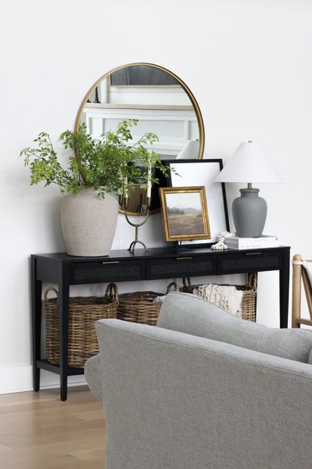 Black console table styling, spring home decor 

#LTKStyleTip #LTKHome #LTKFindsUnder50