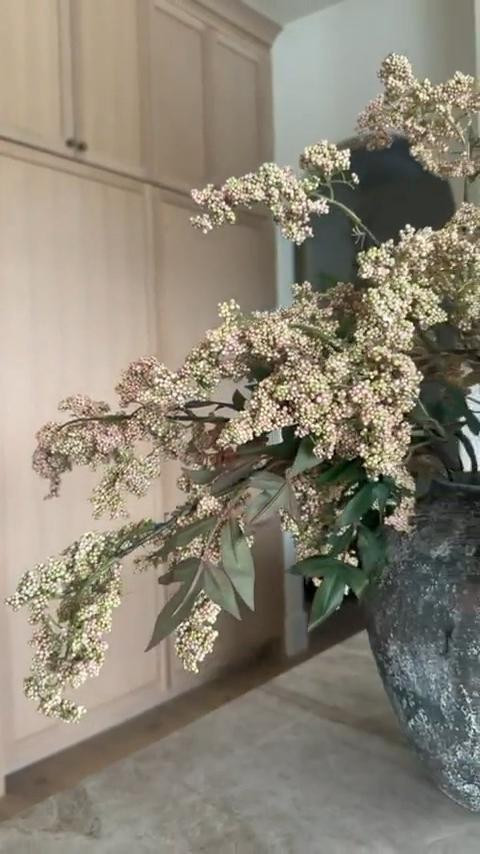 I’ve been using this textured vase with faux stems to add a soft, natural layer to the kitchen. The shape feels grounded and the greenery brings in that organic look without any upkeep.

I like pieces that are easy to move and restyle while still adding warmth and dimension. Sharing the vase and stems I’m using below if you’re looking for simple greenery that works year-round.
 @Wayfair 
@Amazon