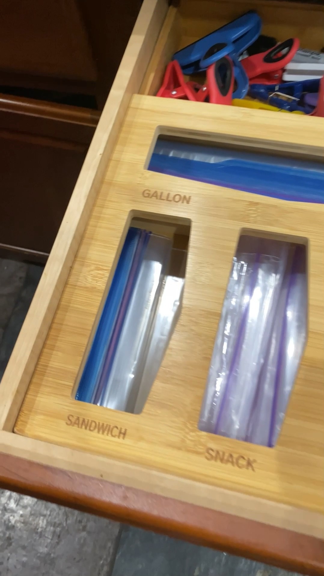 Kitchen drawer organization - love the Ziploc bag organizer. Super easy to refill. Added a rectangular bin for the chip clips and Sharpies.  #organization #kitchen #amazonfind 

#LTKhome