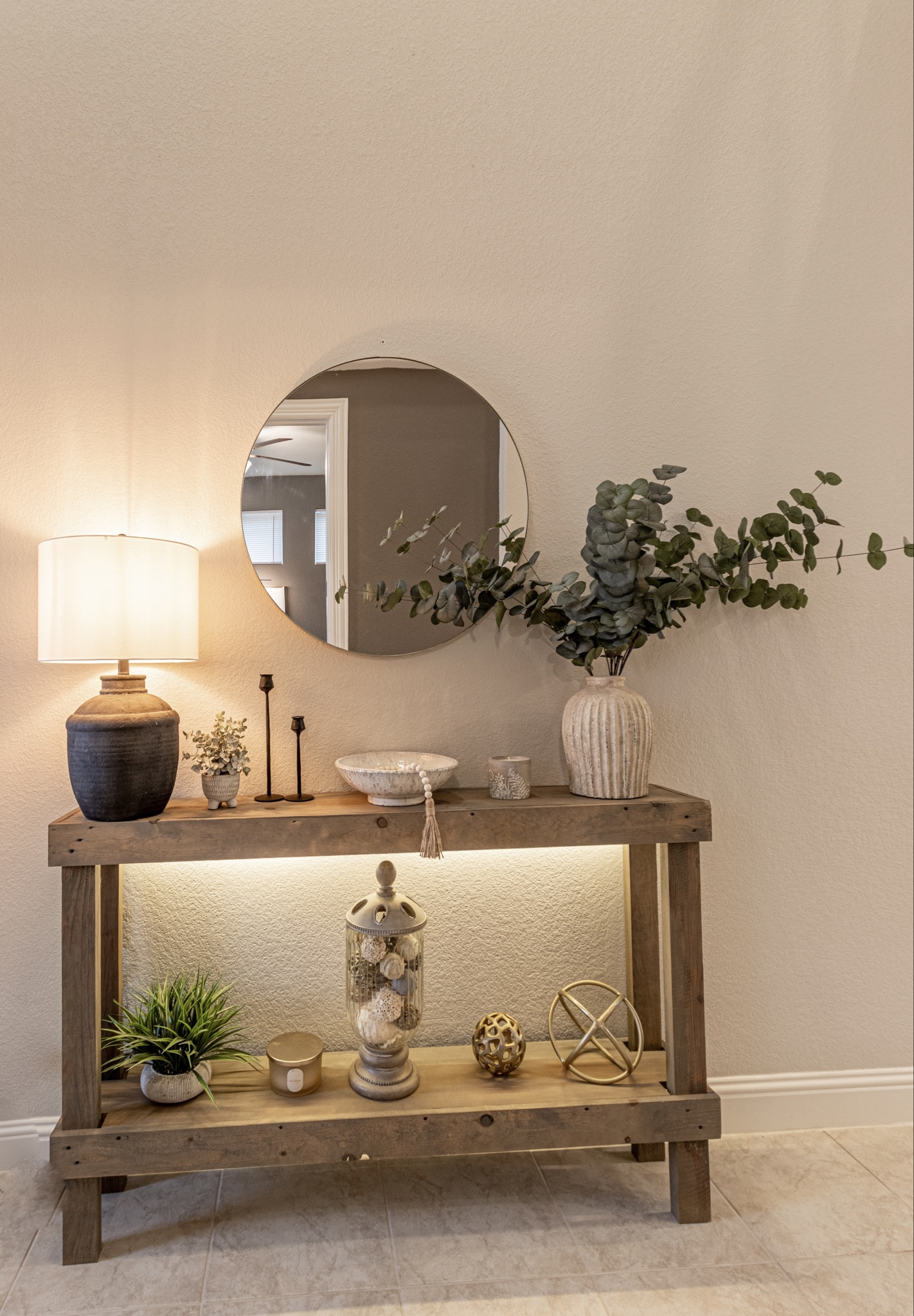 Entrance Decorations. Round mirror, big table lamp, candles with touch of greenery 

#LTKhome #LTKstyletip