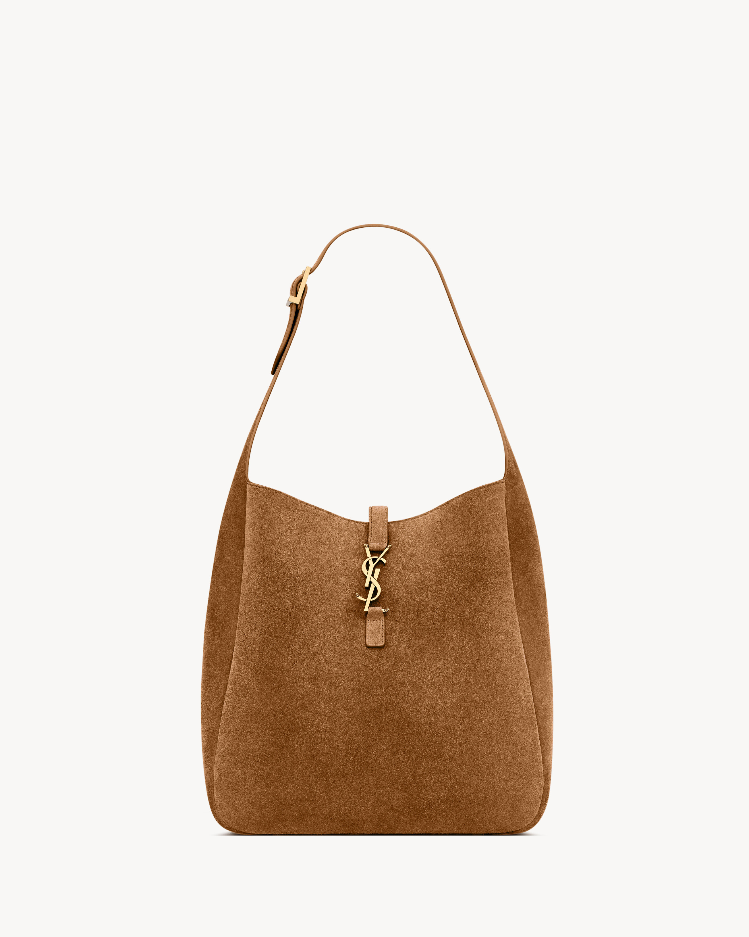 The supple version of the iconic LE 5 À 7, now in suede.This spacious bag features a removable z... | Saint Laurent Inc. (Global)