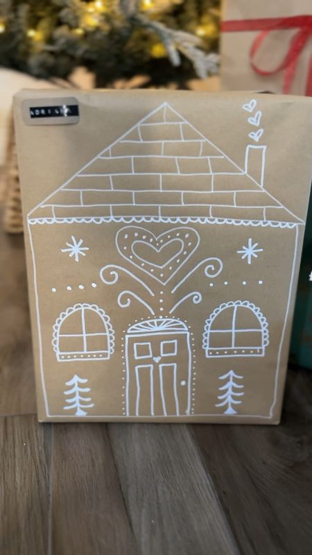 I used a water based paint marker to draw Gingerbread houses on the presents! 😍 how cute are they??

#LTKGiftGuide #LTKHoliday #LTKSeasonal