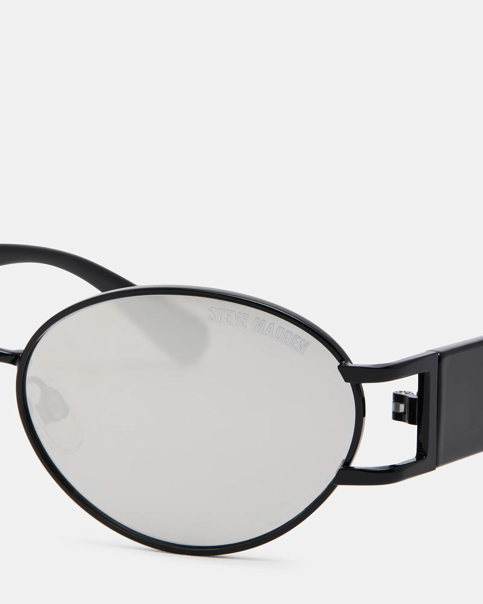 DUTTEN Black Frame Almond Solid Smoke Silver Flash Oval Sunglasses | Steve Madden (US)