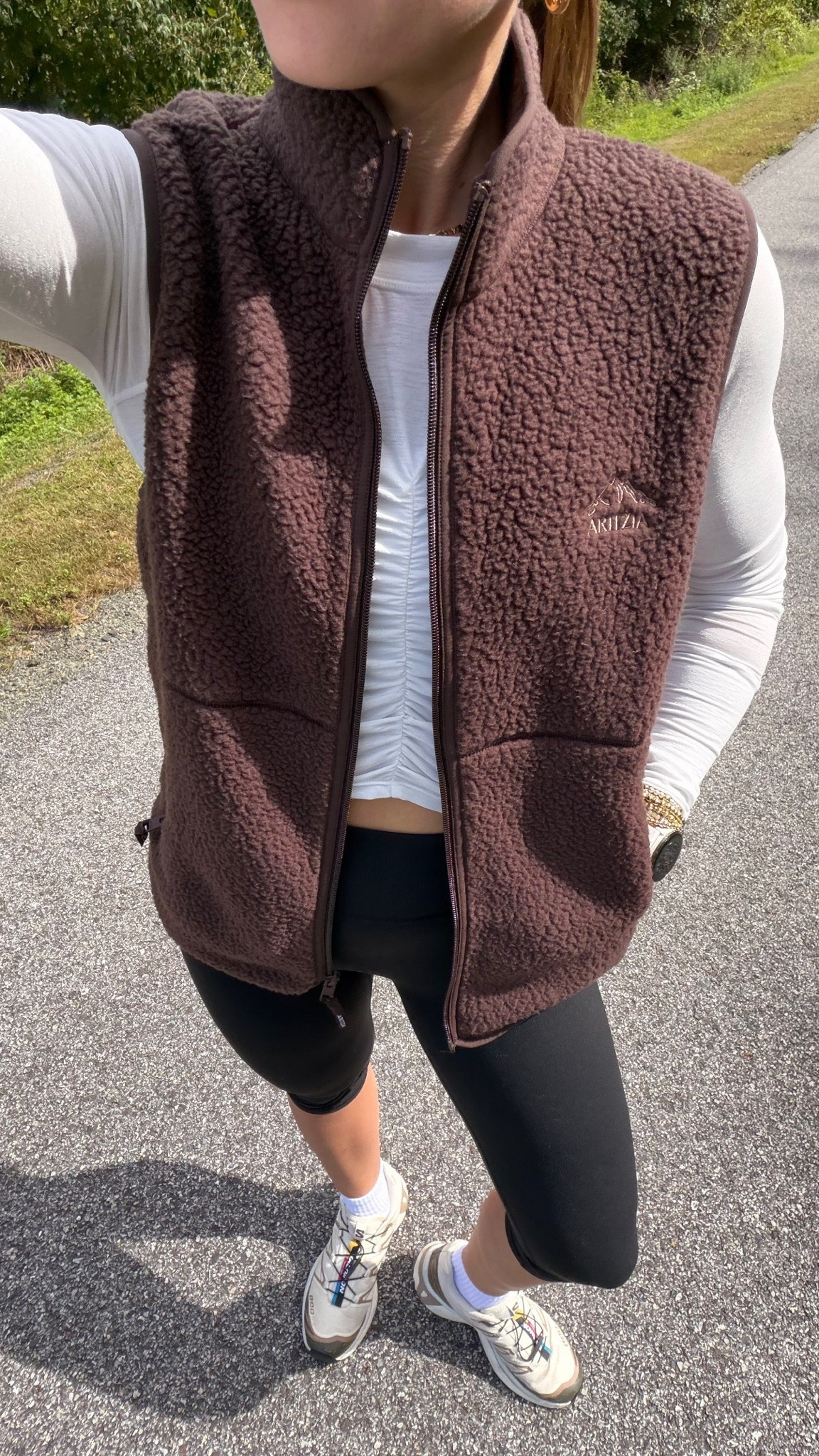 10/5/26 Early Fall Walking Outfit 🍂

My current uniform for an afternoon walk on those early fall transition days 🍂🤎 Capri leggings + socks from Amazon, @FreePeople Movement long sleeve, sneakers + my chocolate brown @Aritzia sherpa vest layered on top.
Finished with Amazon sunglasses — sporty, cozy + perfect for when it’s not quite cold yet. Linking everything I can here!