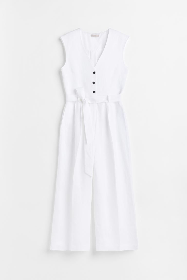 Sleeveless, calf-length jumpsuit in woven fabric. V-neck, buttons at top, and yoke at back with p... | H&M (US + CA)
