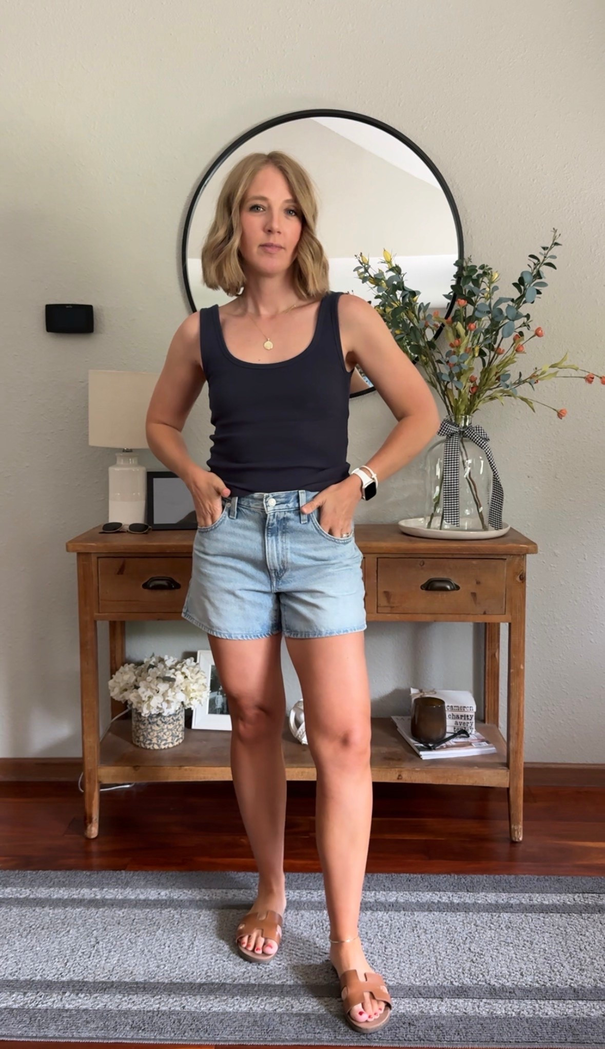 Wearing a small in the tank top, and size 26 in the shorts.

#LTKmomlife #LTKootd