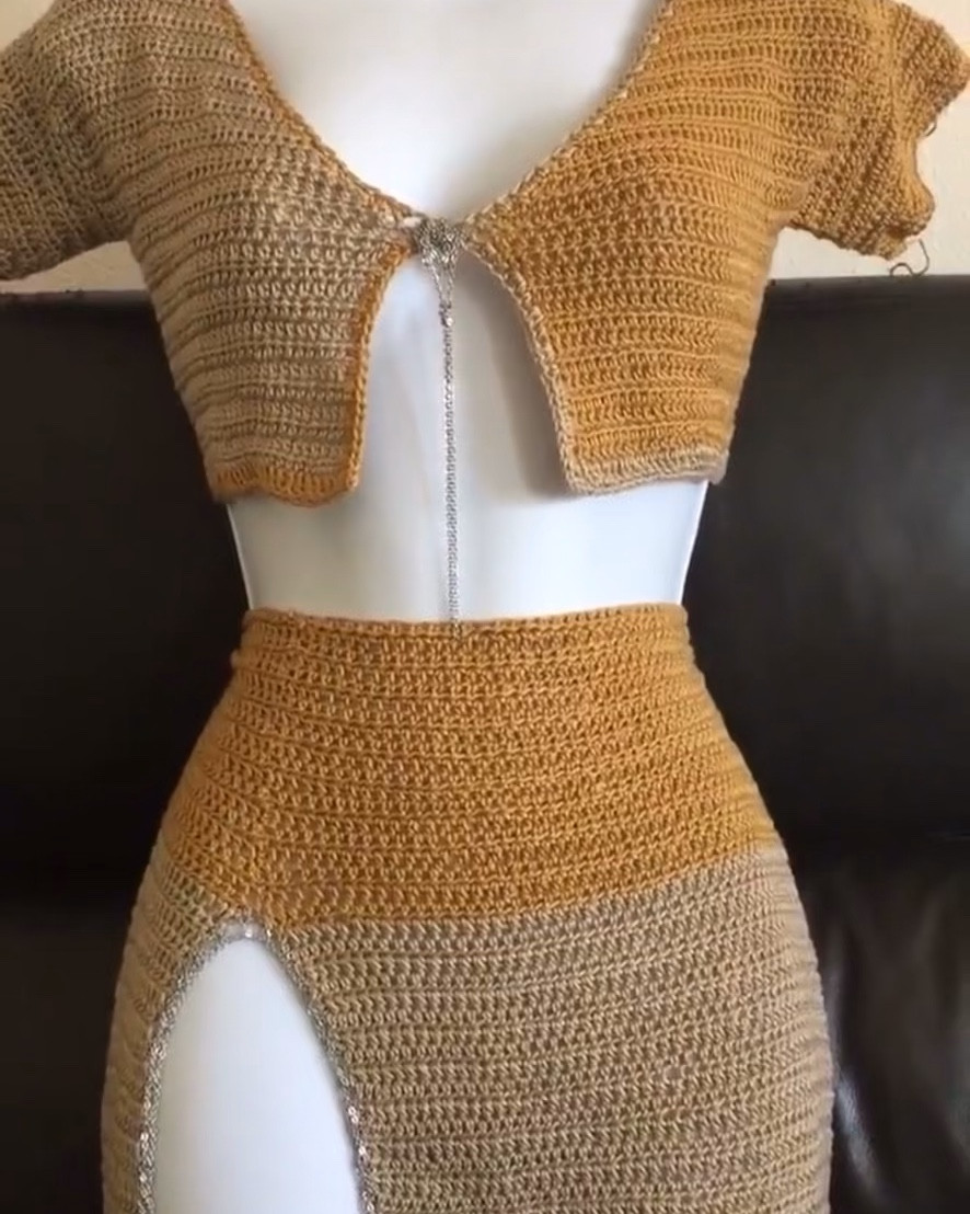 Turn heads in this handmade crochet two-piece set featuring a warm ombré color palette, flirty cropped top, and a high-slit skirt with crystal embellishment 💫✨ Perfect for summer festivals, beach parties, or vacay vibes, this boho-inspired outfit blends artisan craftsmanship with bold, feminine energy. Designed for free spirits who love unique, made-with-love fashion. Custom colors available as well!