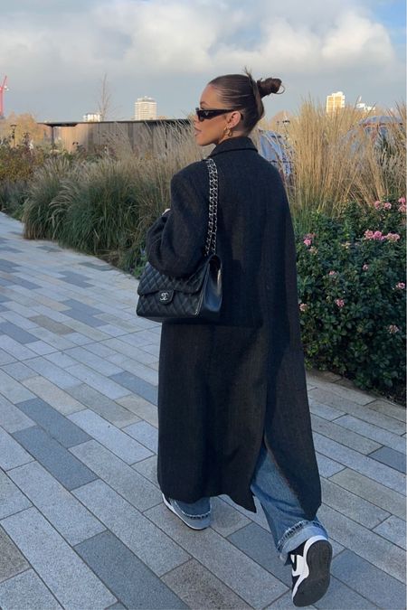 Long black coat outfit inspo | Long coat with jeans and sneakers. | Winter outfit inspo 

#LTKfindsunder100 #LTKSpringSale #LTKSeasonal