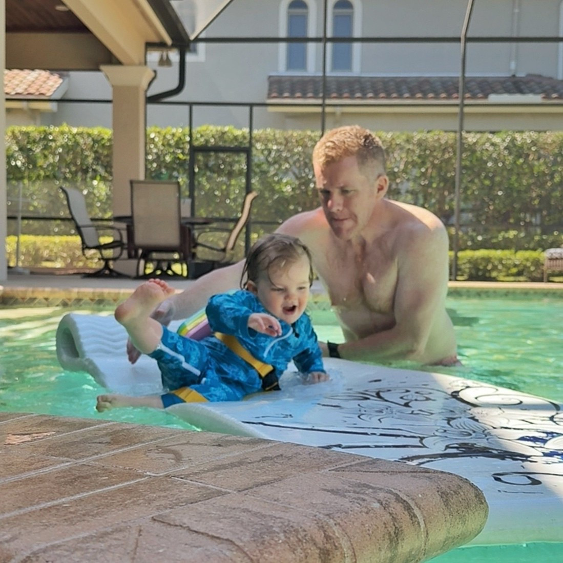 Florida happiness decked out in her sun safe toddler swim - though she doesn’t like to keep the hat on! 