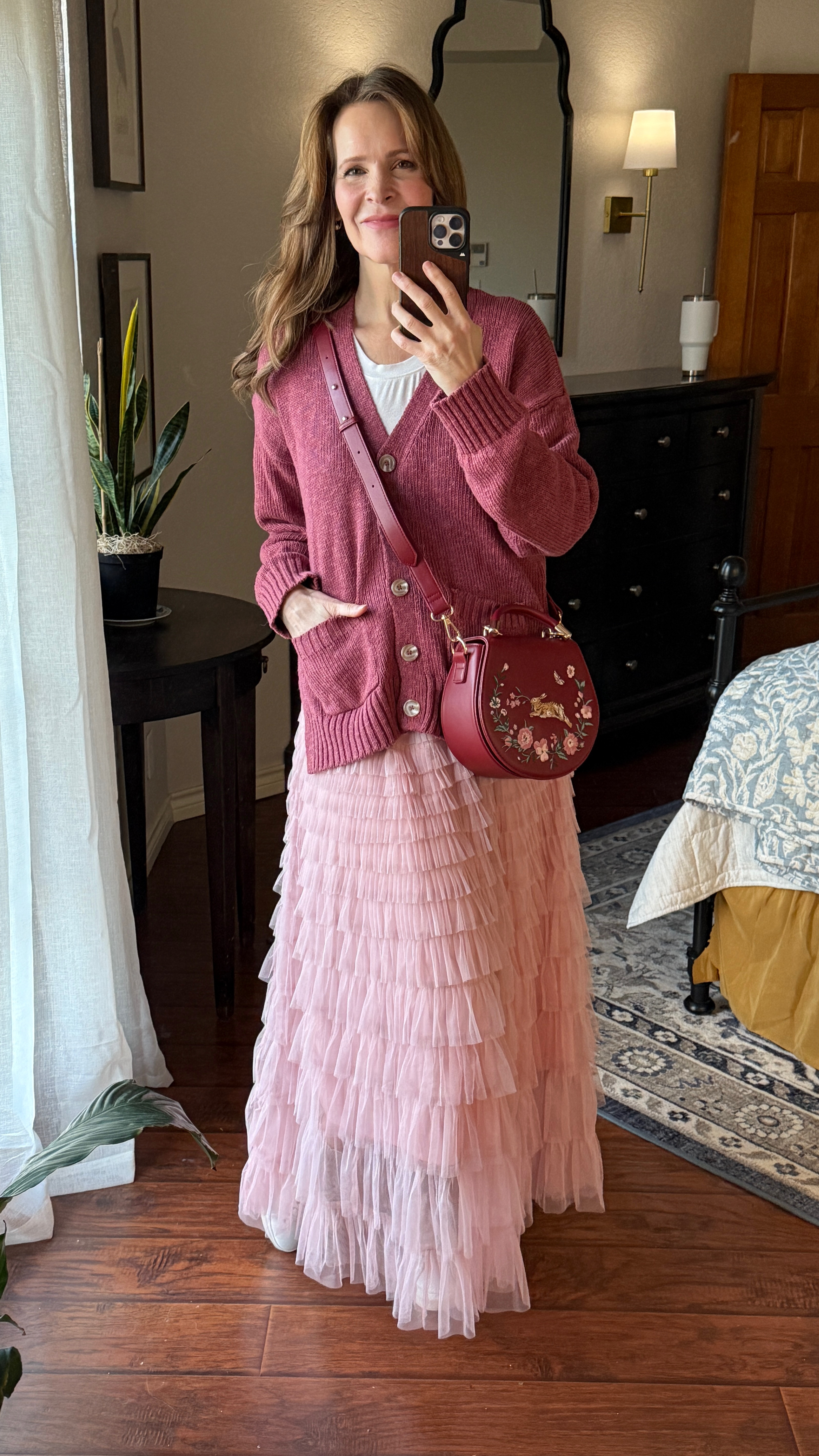 I showed yall this skirt in my last post, but it’s so versatile and fun I decided to try it with a different top. The purse is my birthday present from my husband.  It’s my new favorite for spring.  

#springpurse #redandpink #pinkskirt #over50 #ordinaryhousemouse 

#LTKOver40 #LTKItBag #LTKFindsUnder100