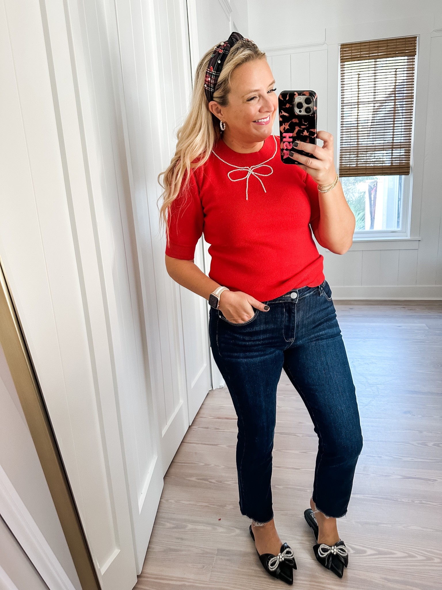 Loving this cute red sweater tee. It’s so cute with the rhinestone bow. Wearing a small and size 26 in jeans   Code FANCY15 for 15% off

#LTKHoliday #LTKSeasonal #LTKstyletip