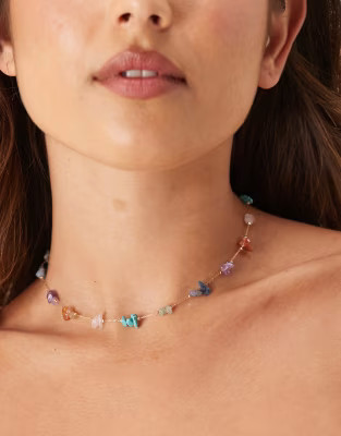 ASOS DESIGN short necklace in gold tone with multi-coloured semi-precious stone chipping detail |... | ASOS (Global)