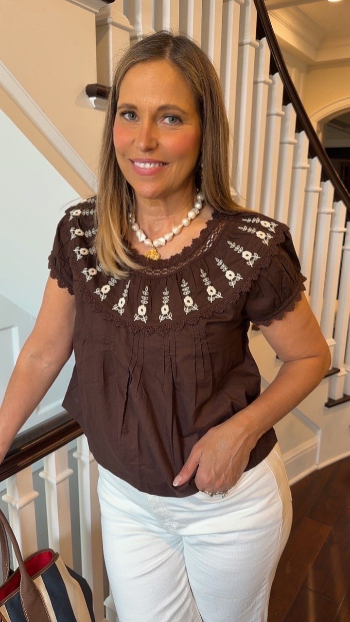 I am obsessed with this top! It pairs perfectly with white jeans and a cute summer bag! The details on the neckline are the statement piece on this outfit!

#LTKootd #LTKOver40 #LTKMidsize