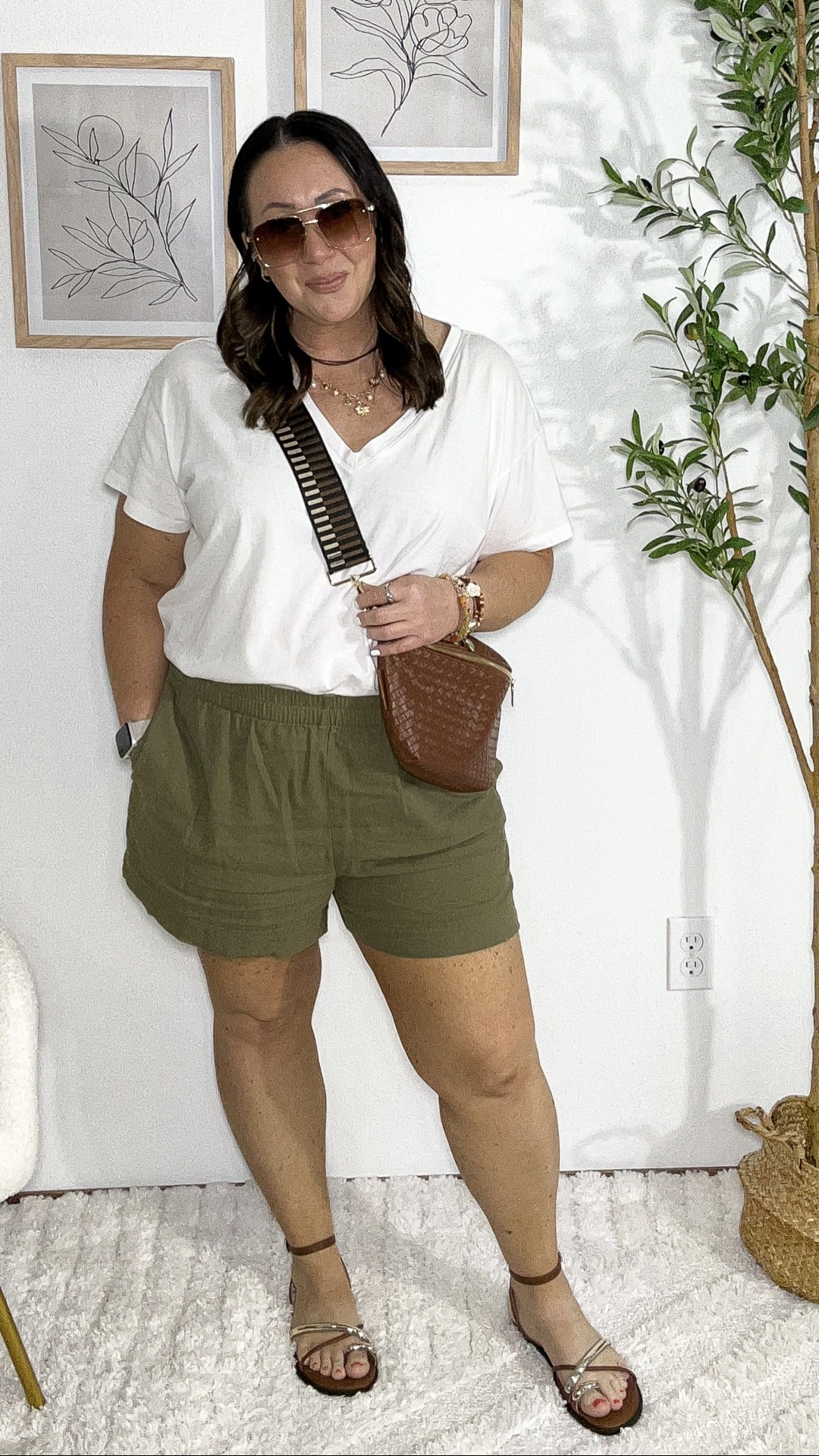 XL tee. XL pull on linen shorts. On sale for $20! New toe ring strappy sandals from Walmart! Fit is true to size. Amazon bag and sunnies. Walmart necklace. AE & Walmart bracelets.

#LTKootd #LTKSaleAlert #LTKMidsize