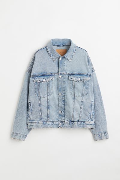 Oversized jacket in thick cotton denim. Collar, metal buttons at front, and yoke at back. Chest p... | H&M (US + CA)
