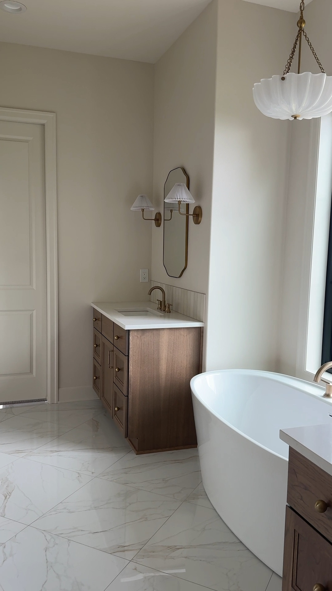 The classic finishes in this bath are everything🙌🏻🤍 many are from @wayfair! #ad #wayfair #wayfairpartner