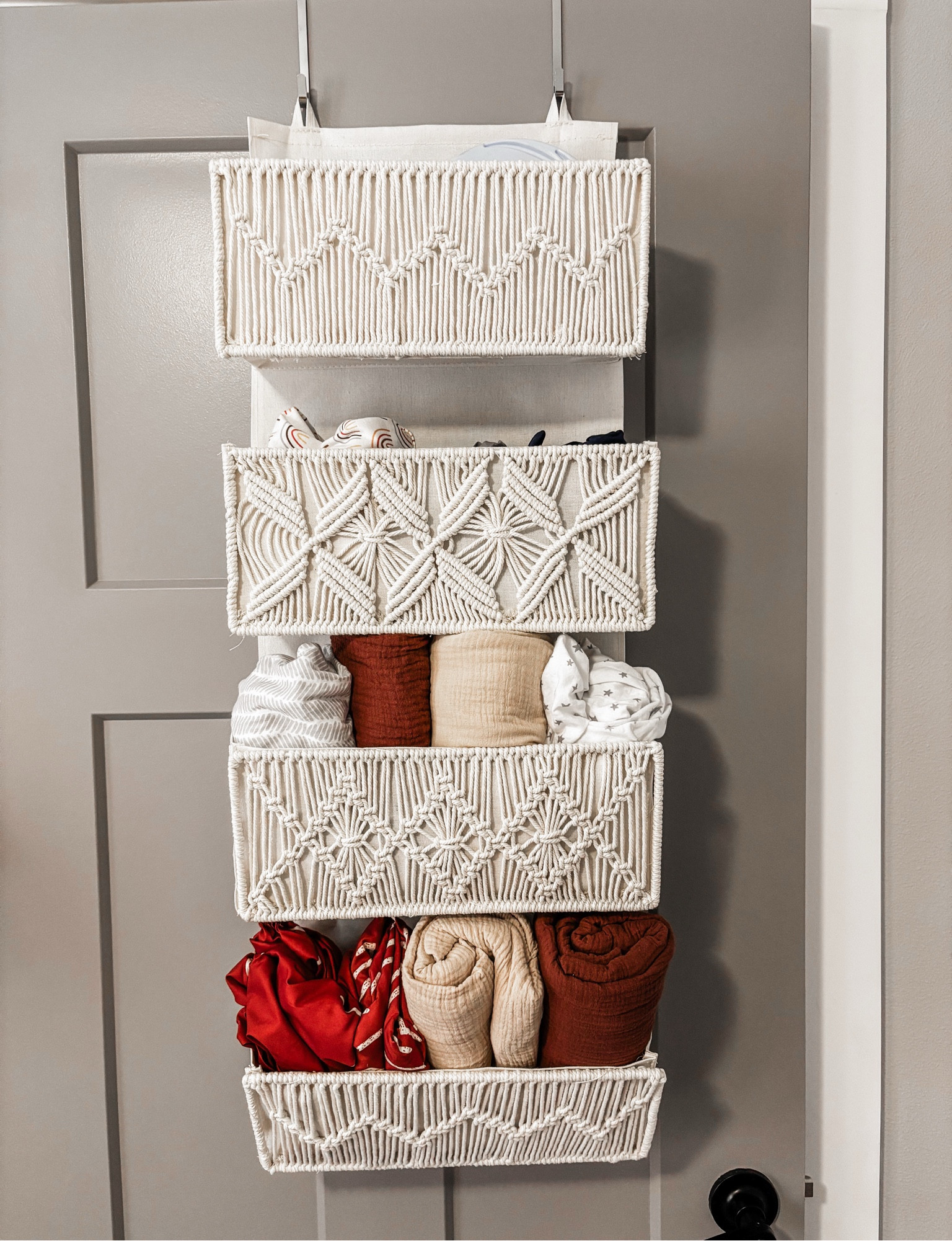 This door organizer is one of my favorite parts of the nursery! I love that it’s essentially out of the way, but has so much storage space 