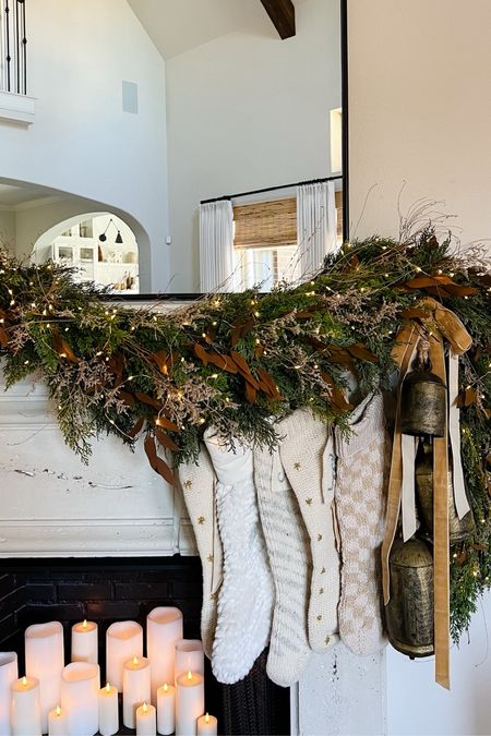 Foraged garland on our mantel with a neutral mix of Christmas stockings, brass bells, and tan velvet ribbon



#LTKHoliday #LTKhome #LTKSeasonal