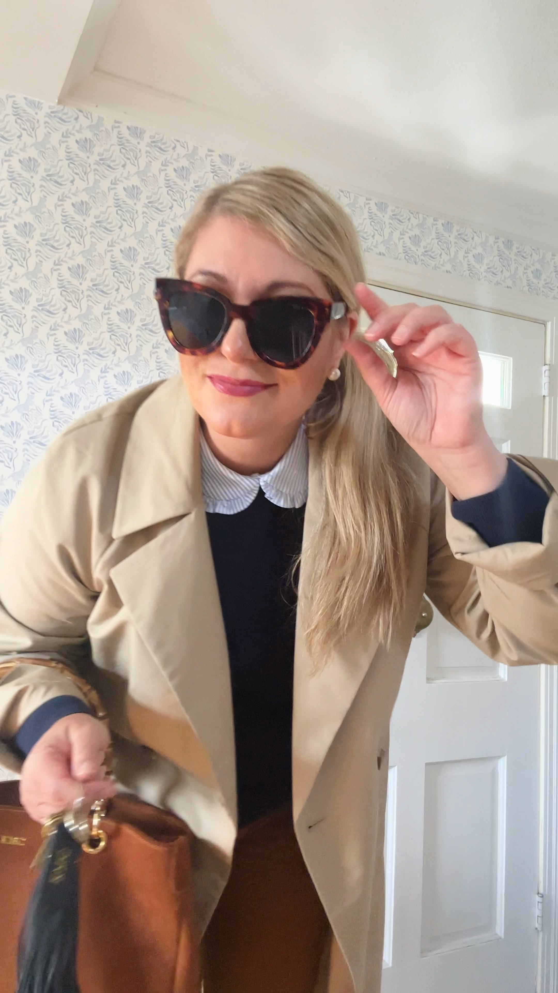 Weekend style with a little fall prep in my step today. Shirting collared blue and navy sweater, classic khaki trench coat (in tall sizing), chestnut straight leg corduroy pants (tall, reg, petite), chestnut suede bamboo handbag, navy tassel key chain, tortoise sunglasses, brooks brothers, j crew, gap

#LTKover40 #LTKmidsize #LTKSeasonal